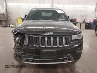 2014 Jeep Grand Cherokee Overland with VIN 1C4RJFCG8EC177899, listed as a IAAI auction lot 41695290 with 200,867 mi miles and . Bid and sale history available at DreamBid. Image 13.