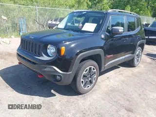 2015 Jeep Renegade Trailhawk with VIN ZACCJBCT1FPC17815, listed as a IAAI auction lot 42043290 with 247,652 mi miles and . Bid and sale history available at DreamBid. Image 2.