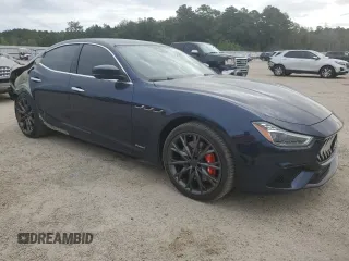 2019 Maserati Ghibli with VIN ZAM57XSS3K1319197, listed as a Copart auction lot 70454084 with 28,584 mi miles and Salvage Title. Bid and sale history available at carsss.com. Image 4.