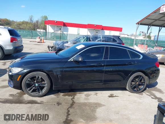 2016 BMW 4 Series 428i xDrive with VIN WBA4C9C53GG135945, listed as a IAAI auction lot 41964691 with 93,273 mi miles and . Bid and sale history available at carsss.com. Image 14.