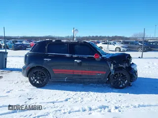 2011 MINI Countryman S with VIN WMWZC5C50BWL55234, listed as a IAAI auction lot 41323339 with 134,709 mi miles and . Bid and sale history available at DreamBid. Image 14.
