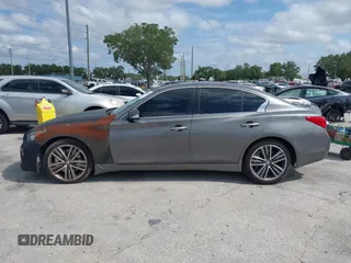2015 Infiniti Q50 Premium with VIN JN1BV7AP8FM352195, listed as a IAAI auction lot 41968813 with 146,542 mi miles. Bid and sale history available at carsss.com. Image 14.
