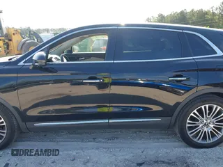 2016 Lincoln MKX Reserve with VIN 2LMTJ6LP9GBL27835, listed as a IAAI auction lot 42175905 with 87,541 mi miles. Bid and sale history available at carsss.com. Image 14.