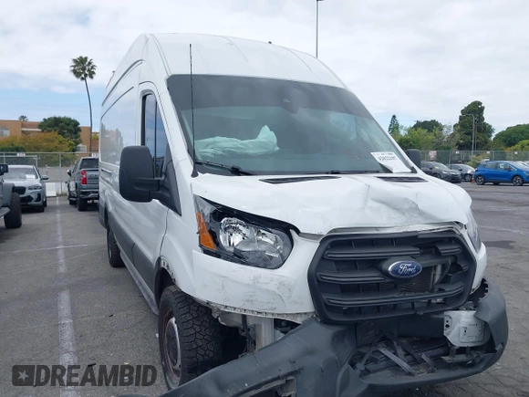 2020 Ford Transit Cargo with VIN 1FTBW3XG2LKB18281, listed as a IAAI auction lot 42022187 with 84,323 mi miles. Bid and sale history available at carsss.com. Image 1.