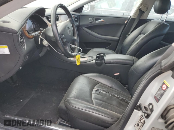 2006 Mercedes-Benz CLS-Class with VIN WDDDJ75X36A020636, listed as a Copart auction lot 77382474 with 133,649 mi miles and Salvage Title. Bid and sale history available at carsss.com. Image 7.