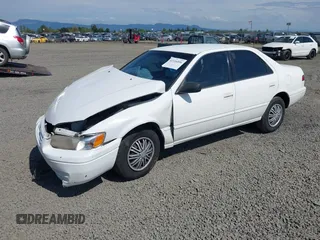 1999 Toyota Camry LE z VIN 4T1BG22K0XU862535, wystawiony jako IAAI lot #42116856 z przebiegiem 186 094 mil mil oraz . Historia ofert i sprzedaży dostępna na DreamBid. Obrazek 18.