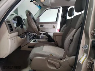 2010 Jeep Liberty Sport with VIN 1J4PN2GK9AW143878, listed as a Copart auction lot 52851095 with 121,357 mi miles and Salvage Title. Bid and sale history available at carsss.com. Image 7.