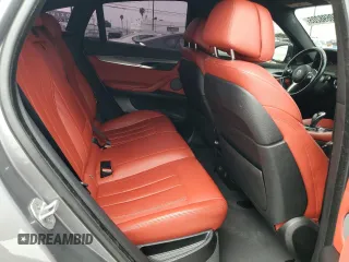 2018 BMW X6 sDrive35i with VIN 5UXKU0C52J0G81057, listed as a Copart auction lot 50698205 with 67,735 mi miles and Salvage Title. Bid and sale history available at carsss.com. Image 12.