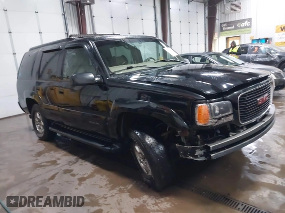 2000 GMC Denali with VIN 1GKEK13R9YR163824, listed as a IAAI auction lot 41245808 with 206,773 mi miles. Bid and sale history available at carsss.com. Image 1.