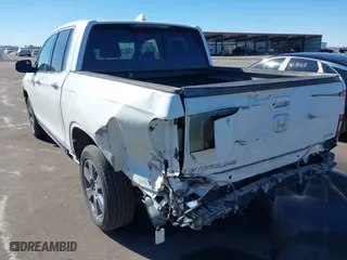 2020 Honda Ridgeline RTL-E with VIN 5FPYK3F76LB005008, listed as a IAAI auction lot 41662580 with 33,987 mi miles. Bid and sale history available at carsss.com. Image 6.