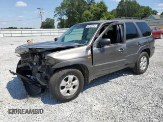 2004 Mazda Tribute ES with VIN 4F2CZ06114KM23991, listed as a Copart auction lot 60740264 with 208,759 mi miles and Salvage Title. Bid and sale history available at carsss.com. Image 1.