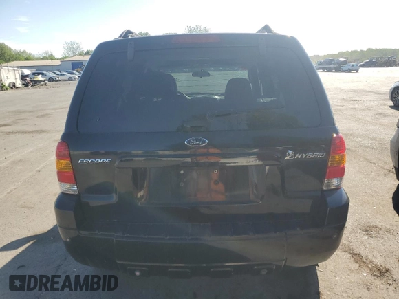 2007 Ford Escape Hybrid с VIN 1FMYU59H27KA96866, выставлен на аукционе Copart как лот 56021285 с пробегом 218 759 миль миль и Списание • Salvage title. История ставок и продаж доступна на DreamBid. Изображение 6.