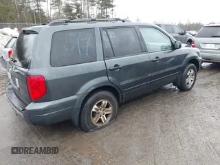 2003 Honda Pilot EX with VIN 2HKYF184X3H561179, listed as a IAAI auction lot 41709312 with 302,368 mi miles. Bid and sale history available at carsss.com. Image 4.