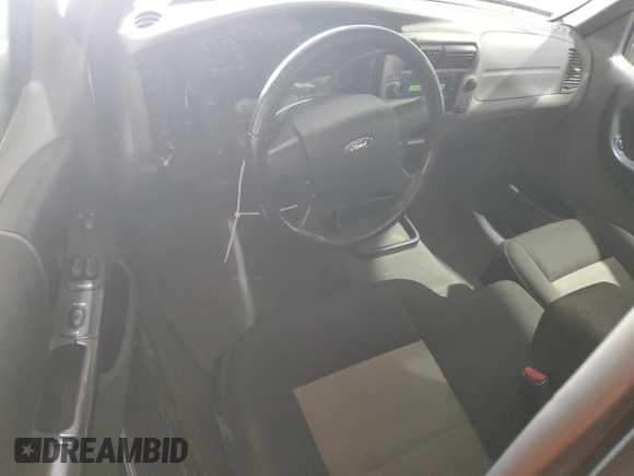 2005 Ford Ranger XLT with VIN 1FTZR45E45PA79874, listed as a Copart auction lot 58463165 with 121,540 mi miles and Salvage title. Bid and sale history available at DreamBid. Image 8.