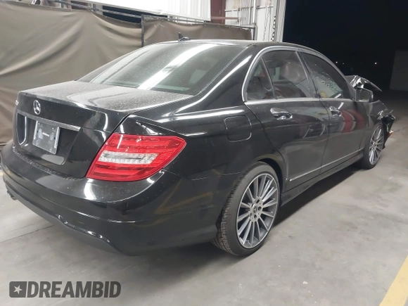 2014 Mercedes-Benz C 250 Sport with VIN WDDGF4HB9EA954859, listed as a IAAI auction lot 42027885 with 64,223 mi miles and . Bid and sale history available at carsss.com. Image 4.