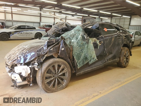 2023 Lexus RX 350 z VIN 2T2BAMCA8PC033728, wystawiony jako Copart lot #52756875 z przebiegiem Nie podano mil oraz Szkoda całkowita • Salvage title. Historia ofert i sprzedaży dostępna na DreamBid. Obrazek 1.
