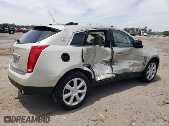 2016 Cadillac SRX Performance Collection with VIN 3GYFNCE32GS508631, listed as a Copart auction lot 60660554 with 92,025 mi miles and Salvage title. Bid and sale history available at DreamBid. Image 3.