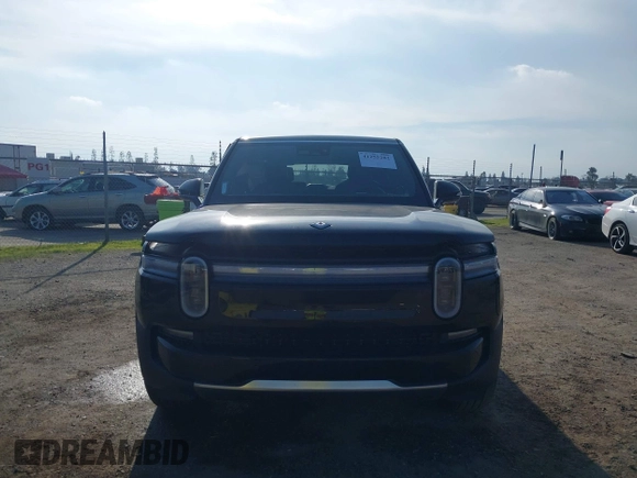 2025 Rivian R1S Adventure with VIN 7PDSGBBAXSN055849, listed as a IAAI auction lot 41255282 with 2,885 mi miles. Bid and sale history available at carsss.com. Image 13.