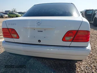 1999 Mercedes-Benz E-Class with VIN WDBJF65H6XA867166, listed as a IAAI auction lot 42017341 with 89,841 mi miles. Bid and sale history available at carsss.com. Image 16.