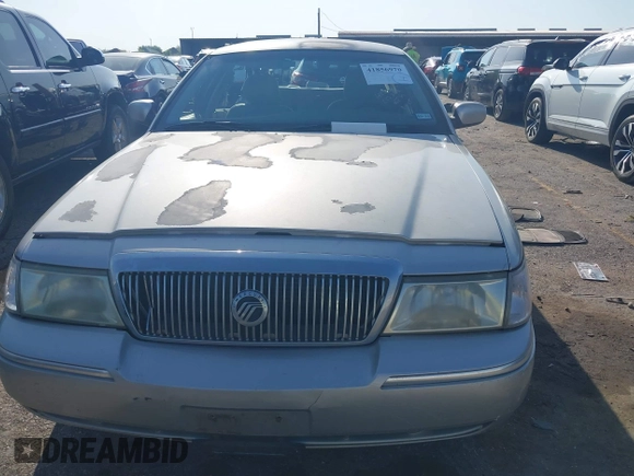 2004 Mercury Grand Marquis GS with VIN 2MEFM74W34X677247, listed as a IAAI auction lot 41856970 with 135,225 mi miles and . Bid and sale history available at DreamBid. Image 11.