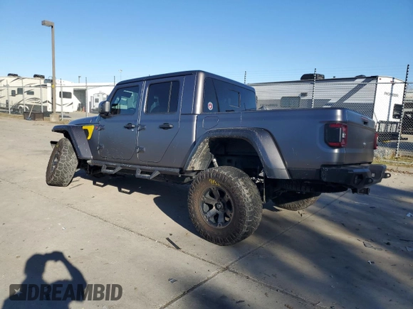 2021 Jeep Gladiator Rubicon с VIN 1C6JJTBM4ML594204, выставлен на аукционе Copart как лот 83998224 с пробегом 25 852 миль миль и Списание • Salvage title. История ставок и продаж доступна на DreamBid. Изображение 2.