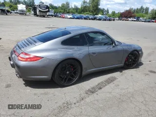 2009 Porsche 911 Carrera S z VIN WP0AB29929S720512, wystawiony jako Copart lot #56697685 z przebiegiem 36 676 mil mil oraz Szkoda całkowita • Salvage title. Historia ofert i sprzedaży dostępna na DreamBid. Obrazek 3.