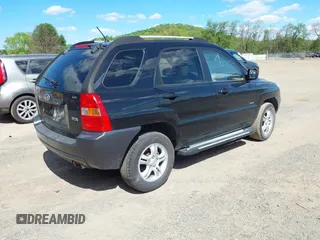 2006 Kia Sportage LX z VIN KNDJE723167188114, wystawiony jako IAAI lot #42209954 z przebiegiem 77 877 mil mil oraz . Historia ofert i sprzedaży dostępna na DreamBid. Obrazek 4.