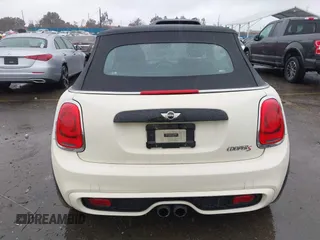 2016 MINI Convertible S z VIN WMWWG9C52G3C21934, wystawiony jako IAAI lot #41569029 z przebiegiem 102 042 mil mil oraz . Historia ofert i sprzedaży dostępna na DreamBid. Obrazek 17.