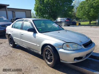 1999 Honda Civic VP with VIN 2HGEJ6616XH537100, listed as a IAAI auction lot 42018708 with 229,594 mi miles. Bid and sale history available at carsss.com. Image 1.