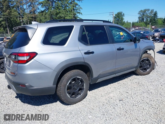 2025 Honda Pilot TrailSport z VIN 5FNYG1H64SB020902, wystawiony jako IAAI lot #42455539 z przebiegiem 11 645 mil mil oraz . Historia ofert i sprzedaży dostępna na DreamBid. Obrazek 4.