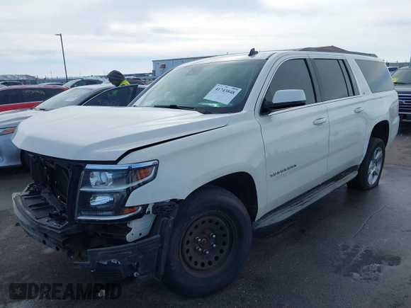 2015 Chevrolet Suburban LT with VIN 1GNSKJKC0FR309866, listed as a IAAI auction lot 41743848 with 220,778 mi miles and . Bid and sale history available at DreamBid. Image 17.