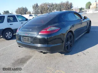 2011 Porsche Panamera with VIN WP0AA2A71BL013687, listed as a IAAI auction lot 41647569 with 116,685 mi miles. Bid and sale history available at carsss.com. Image 4.