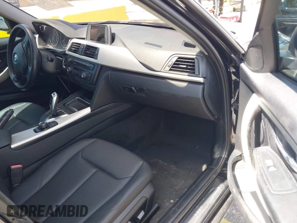 2014 BMW 3 Series 320i with VIN WBA3B1C55EK135357, listed as a IAAI auction lot 42158550 with 148,911 mi miles. Bid and sale history available at carsss.com. Image 5.