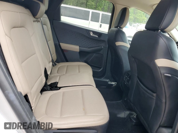 2020 Ford Escape SEL z VIN 1FMCU9H66LUB44403, wystawiony jako Copart lot #57934925 z przebiegiem Nie podano mil oraz Szkoda całkowita • Salvage title. Historia ofert i sprzedaży dostępna na DreamBid. Obrazek 11.
