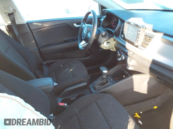 2020 Kia Rio S with VIN 3KPA24AD8LE302090, listed as a IAAI auction lot 41313049 with 80,021 mi miles. Bid and sale history available at carsss.com. Image 5.