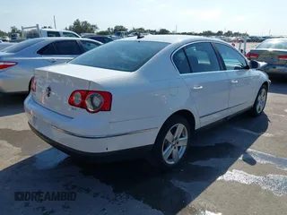 2009 Volkswagen Passat z VIN WVWJK93C29P033434, wystawiony jako IAAI lot #41698532 z przebiegiem 129 256 mil mil oraz . Historia ofert i sprzedaży dostępna na DreamBid. Obrazek 4.