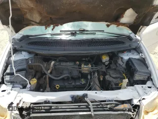 2005 Dodge Caravan SXT z VIN 2D4GP44L15R380469, wystawiony jako Copart lot #58800775 z przebiegiem Nie podano mil oraz Szkoda całkowita • Salvage title. Historia ofert i sprzedaży dostępna na DreamBid. Obrazek 12.