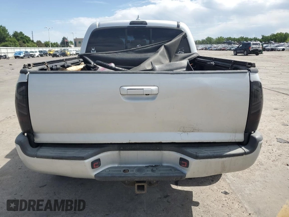2012 Toyota Tacoma with VIN 5TFLU4ENXCX027960, listed as a Copart auction lot 60689025 with 209,480 mi miles and Salvage title. Bid and sale history available at DreamBid. Image 6.
