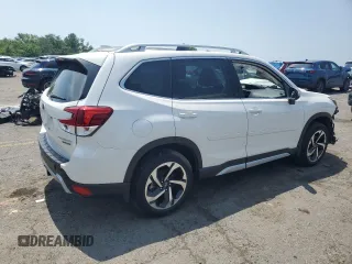 2023 Subaru Forester Touring z VIN JF2SKARC5PH522318, wystawiony jako Copart lot #63442695 z przebiegiem 12 038 mil mil oraz Szkoda całkowita • Salvage title. Historia ofert i sprzedaży dostępna na DreamBid. Obrazek 3.