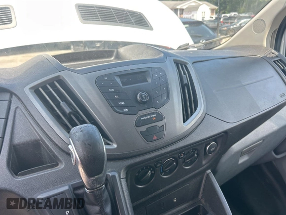 2016 Ford Transit Cargo with VIN 1FTYE1YM2GKB48795, listed as a IAAI auction lot 42854425 with 198,381 mi miles and . Bid and sale history available at DreamBid. Image 8.