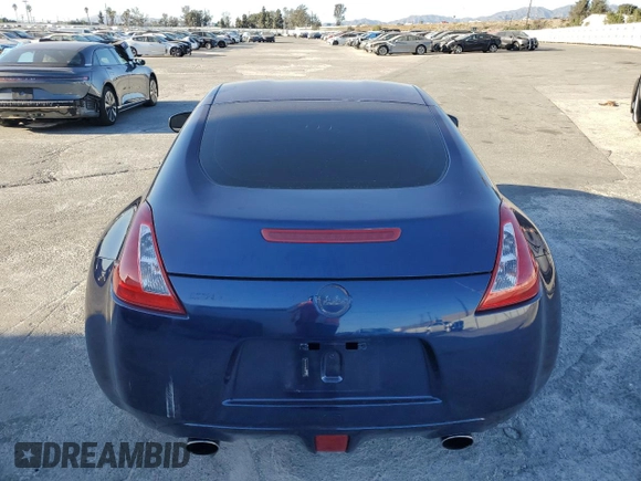2017 Nissan 370Z z VIN JN1AZ4EH6HM952086, wystawiony jako Copart lot #88158105 z przebiegiem Nie podano mil oraz Szkoda całkowita • Salvage title. Historia ofert i sprzedaży dostępna na DreamBid. Obrazek 6.