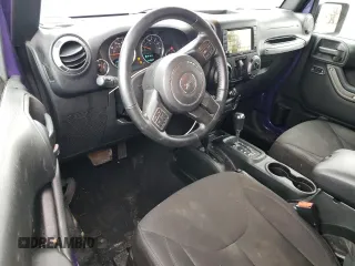 2017 Jeep Wrangler Willys Wheeler with VIN 1C4AJWAG0HL641188, listed as a Copart auction lot 52814005 with 94,959 mi miles and Salvage Title. Bid and sale history available at DreamBid. Image 8.