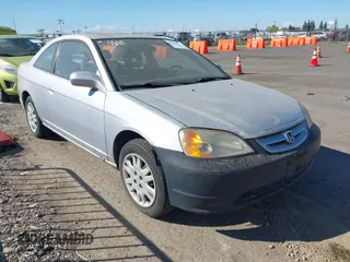 2003 Honda Civic EX with VIN 1HGEM229X3L072586, listed as a IAAI auction lot 40634772 with 202,134 mi miles and . Bid and sale history available at DreamBid. Image 1.