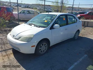 2003 Toyota Prius with VIN JT2BK18U130078557, listed as a IAAI auction lot 42099177 with 135,894 mi miles. Bid and sale history available at carsss.com. Image 2.