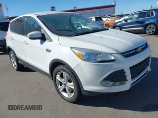 2014 Ford Escape SE with VIN 1FMCU9G90EUC24911, listed as a IAAI auction lot 42068333 with 209,268 mi miles. Bid and sale history available at carsss.com. Image 1.