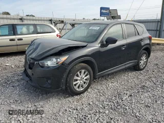 2014 Mazda CX-5 Touring with VIN JM3KE2CY9E0375990, listed as a Copart auction lot 50875165 with 166,574 mi miles and Salvage Title. Bid and sale history available at carsss.com. Image 1.