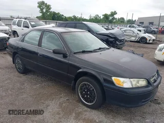 2001 Toyota Camry CE z VIN 4T1BG22K81U054795, wystawiony jako IAAI lot #42359932 z przebiegiem 167 341 mil mil oraz . Historia ofert i sprzedaży dostępna na DreamBid. Obrazek 1.