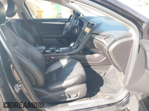 2016 Ford Fusion Titanium with VIN 3FA6P0K92GR284491, listed as a IAAI auction lot 41824323 with 148,016 mi miles. Bid and sale history available at carsss.com. Image 5.