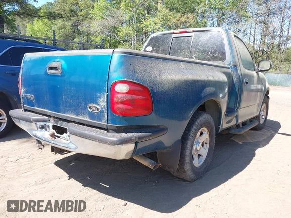 2000 Ford F-150 XL with VIN 1FTZF0722YKB38958, listed as a IAAI auction lot 42050827 with 235,315 mi miles. Bid and sale history available at carsss.com. Image 4.