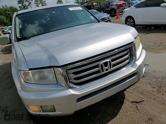 2014 Honda Ridgeline RTL with VIN 5FPYK1F58EB012869, listed as a Copart auction lot 51854995 with 318,950 mi miles and Salvage title. Bid and sale history available at DreamBid. Image 13.